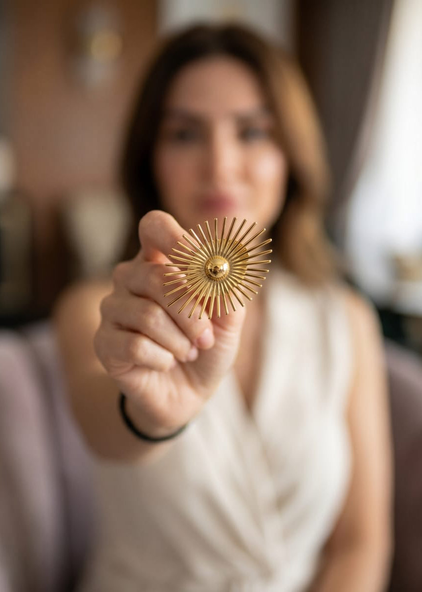 SUNBURST RADINTS BROOCH